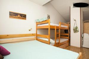 Postel nebo postele na pokoji v ubytování Apartment Dubravka I