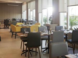 Гостиная зона в Regency Barra Hotel