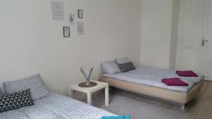 Posteľ alebo postele v izbe v ubytovaní Apartament Vistula