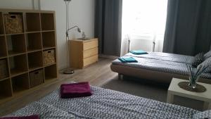 Posteľ alebo postele v izbe v ubytovaní Apartament Vistula