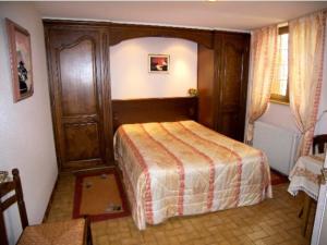 Ένα ή περισσότερα κρεβάτια σε δωμάτιο στο Hôtel Restaurant À la ville de Nancy