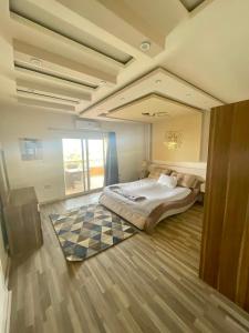 Ένα ή περισσότερα κρεβάτια σε δωμάτιο στο Venues villa