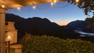 a room with a view of a river and mountains at Verdeblu in Barrea