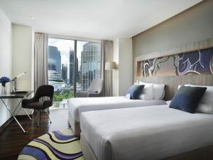 Katil atau katil-katil dalam bilik di Novotel Bangkok Sukhumvit 20