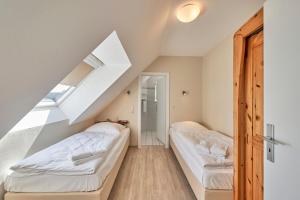 Postel nebo postele na pokoji v ubytování Pamir - 26