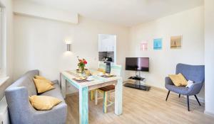 TV a/nebo společenská místnost v ubytování Pamir - 26