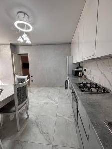 Η κουζίνα ή μικρή κουζίνα στο MarMar Guest House 2 +2 φωτογραφίες
