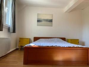 a bedroom with a bed in a room at Cozy family home in Champagne-en-Ardenne 8p in Rubigny