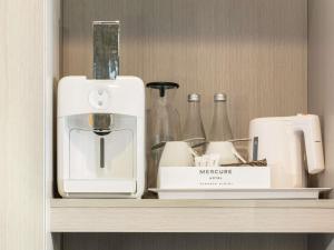Příslušenství pro přípravu čaje a kávy v ubytování Mercure Jakarta Cikini + 54 fotografií