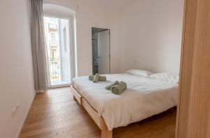 Postel nebo postele na pokoji v ubytování Casa Bonbella