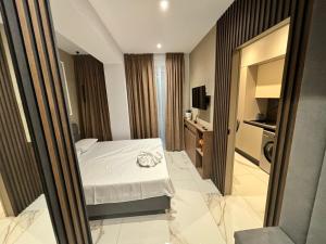 Giường trong phòng chung tại Zlata Vuia Loft Apartments 14