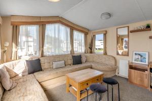 Χώρος καθιστικού στο Burgh Castle Stay