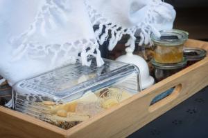 a drawer filled with food in a wooden box at Le Temps de Livresse in Namur +16 photos