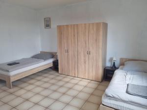 Ένα ή περισσότερα κρεβάτια σε δωμάτιο στο Cozy Apartment in Hattersheim
