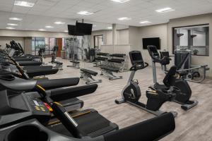 a gym with treadmills and cardio equipment in a room at Marriott North Austin Round Rock in Round Rock