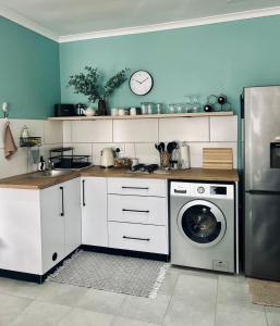 Køkken eller tekøkken på The Bungalow 2 min walk to The Point