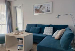 Posezení v ubytování Apartment 11 "Seglerglück" + 11 fotografií