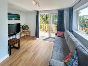 TV a/nebo společenská místnost v ubytování Sea Home + 10 fotografií