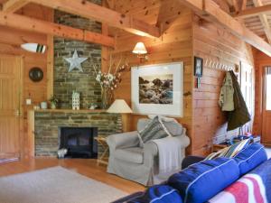 Posezení v ubytování Maple Leaf Cottage