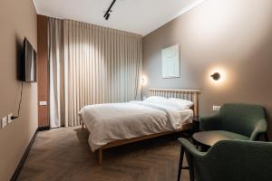 Et tv og/eller underholdning på דירות על הים - קויפמן