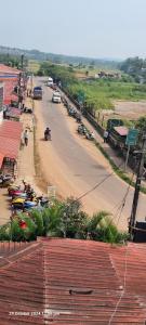 an aerial view of a street in a town at baga beach see side in Samuāpur