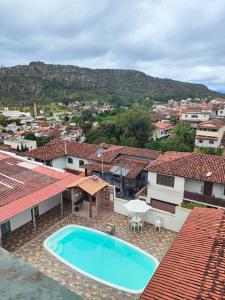 an image of a swimming pool on the roof of a house at Pousada Sinhá Moça in Diamantina