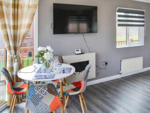 TV a/nebo společenská místnost v ubytování Jacks Place