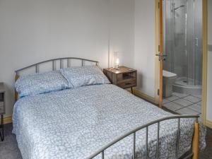 En eller flere senge i et værelse på Getaway + 7 billeder