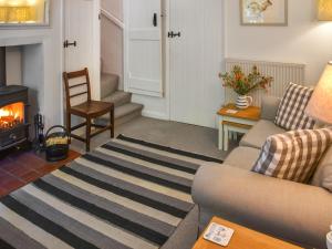 Posezení v ubytování Eva's Cottage