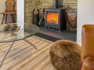 Posezení v ubytování Tegfryn Cottage