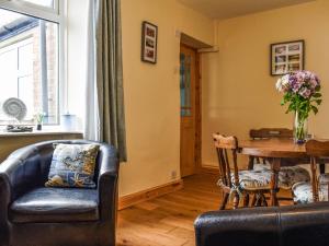 Et opholdsområde på Old Port Cottage