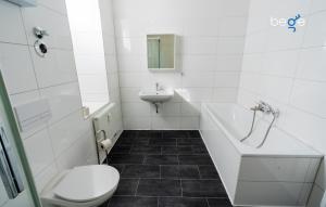 Ένα μπάνιο στο BEGE APARTMENTS CrewLodge