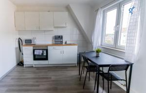 Η κουζίνα ή μικρή κουζίνα στο BEGE APARTMENTS CrewLodge