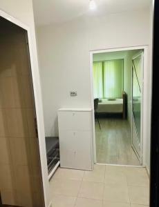 Ένα ή περισσότερα κρεβάτια σε δωμάτιο στο MitrovicHouse