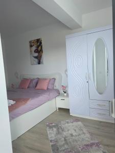 Katil atau katil-katil dalam bilik di Divine Luxury Rasnov