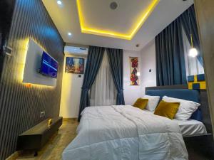 Ένα ή περισσότερα κρεβάτια σε δωμάτιο στο Richmond court