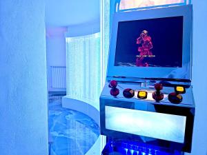 a room with a aquarium with figurines in it at The Igloo Milano -Luxury Eclectic Suite - Jacuzzi - MilanoFlats in Milan +44 photos