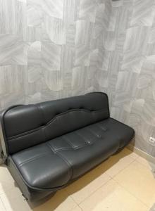 Posezení v ubytování Apartemen modern di Gold Coast PIK