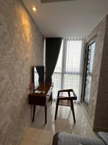 Posezení v ubytování Apartemen modern di Gold Coast PIK