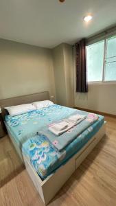 Ένα ή περισσότερα κρεβάτια σε δωμάτιο στο Peaceful Stay at MT Cozy New Room Self Check-in