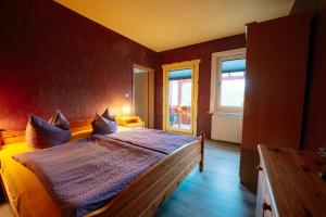 En eller flere senge i et værelse på Apartments Carmen-Braunlage