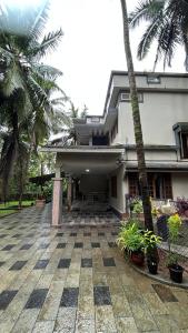 Фотография из галереи Gurukripa Homestay в городе Kānnangād