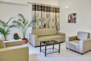 Et opholdsområde på Hotel O Homes Vardhan House 2