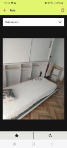 a picture of a white bed in a room at FC house in Valencia