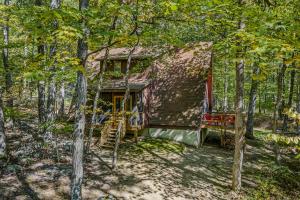 an old house in the middle of the woods at Cozy - Experience It All in Berkeley Springs