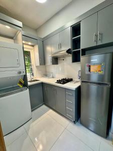 Η κουζίνα ή μικρή κουζίνα στο Affordable room near the beach