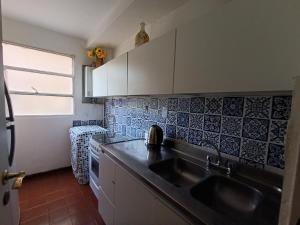 Dapur atau dapur kecil di Microcentro Sanjuanino +9 gambar