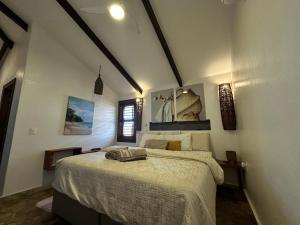 a bedroom with a large bed in a room at Casa nova in Prea
