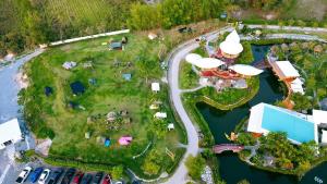 an aerial view of a park with a campground at Waew Arun Garden Resort in Ban Na Chik