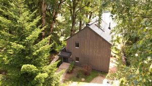 an overhead view of a small house in the woods at SeeZeit am Ossiacher See in Bodensdorf